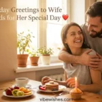 A husband hugging his smiling wife from behind during a birthday breakfast with pancakes and a cupcake, representing sweet birthday greetings to wife.