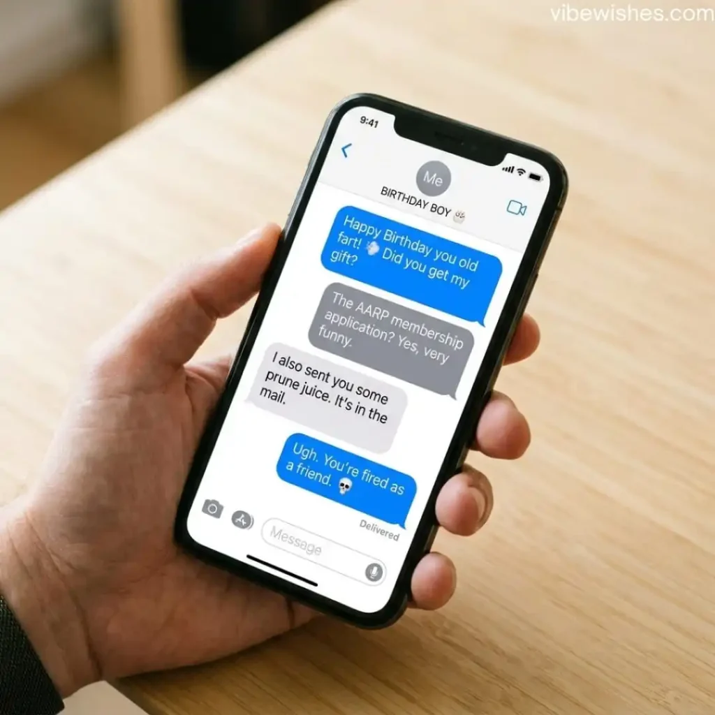 A hand holding a phone with a funny text message conversation featuring funny birthday sayings for wife.